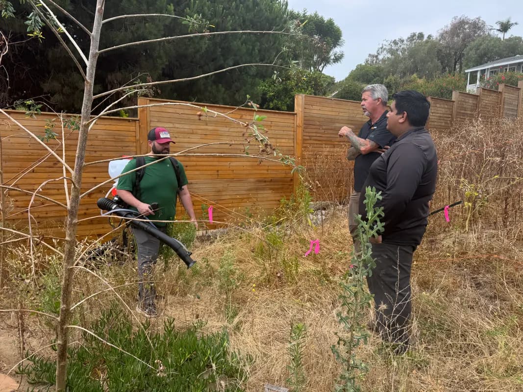 Backpack spray application along a fence line