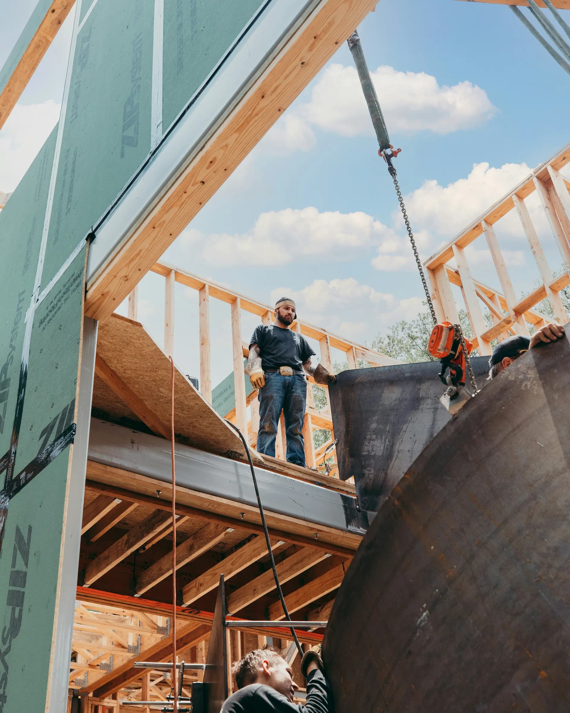 Timber-frame construction with crane